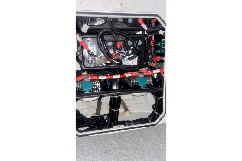 Slide: The Image of 2024 Axopar 37 XC Cross Cabin electrical system with wiring and components. - 79