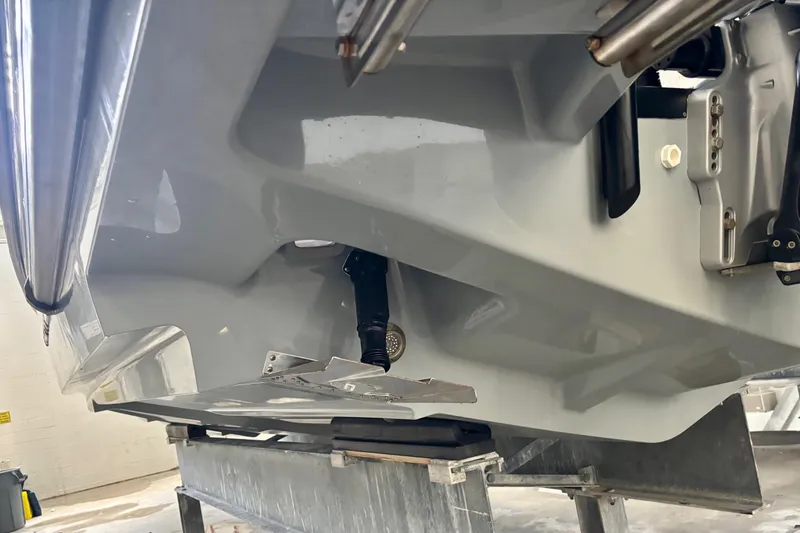 Slide: The Image of 2024 Axopar 37 XC Cross Cabin hull detail with underwater components. - 8