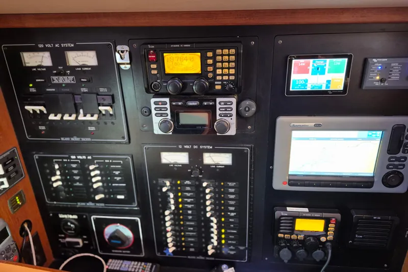 Slide: The Image of Control panel of a 2006 Island Packet 440 yacht with navigation and communication systems. - 15