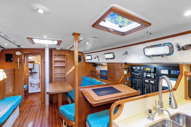 Slide: The Image of Interior of 2006 Island Packet 440 yacht with wood finish and modern amenities. - 16