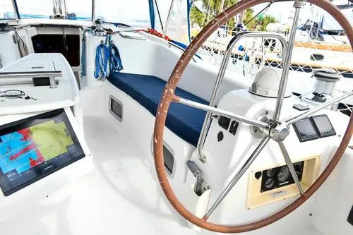 Slide: The Image of Deck of 2008 Beneteau Oceanis 46 sailboat with winch and colorful ropes. - 12