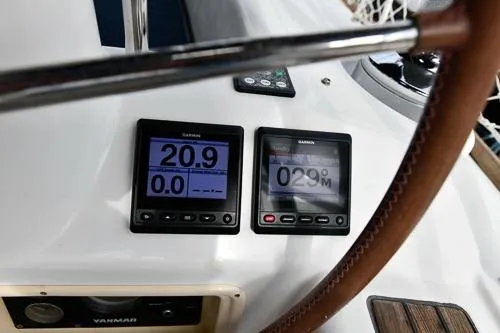 Slide: The Image of Close-up of 2008 Beneteau Oceanis 46 sailboat deck with winch and ropes. - 13
