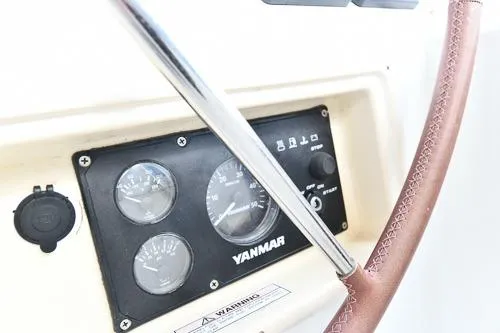 Slide: The Image of 2008 Beneteau Oceanis 46 sailboat deck with colorful rigging and hatches. - 14