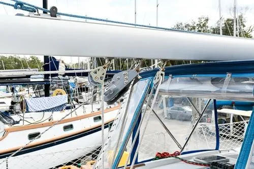Slide: The Image of 2008 Beneteau Oceanis 46 sailboat docked in marina, featuring rigging and cockpit details. - 29