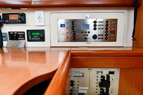 Slide: The Image of Interior of 2008 Beneteau Oceanis 46 yacht kitchen with wood finish and modern appliances. - 35
