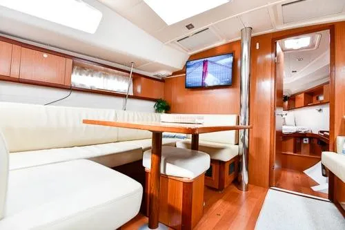 Slide: The Image of Control panel of 2008 Beneteau Oceanis 46 sailboat, featuring navigation and electrical systems. - 37