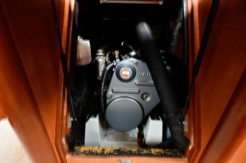 Slide: The Image of Engine compartment of 2008 Beneteau Oceanis 46 sailboat, showcasing mechanical components. - 50