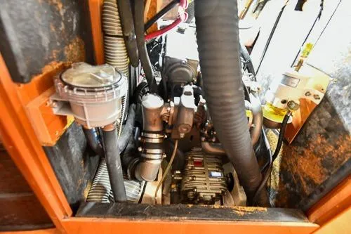 Slide: The Image of Engine compartment of a 2008 Beneteau Oceanis 46 sailboat, showcasing mechanical components. - 51