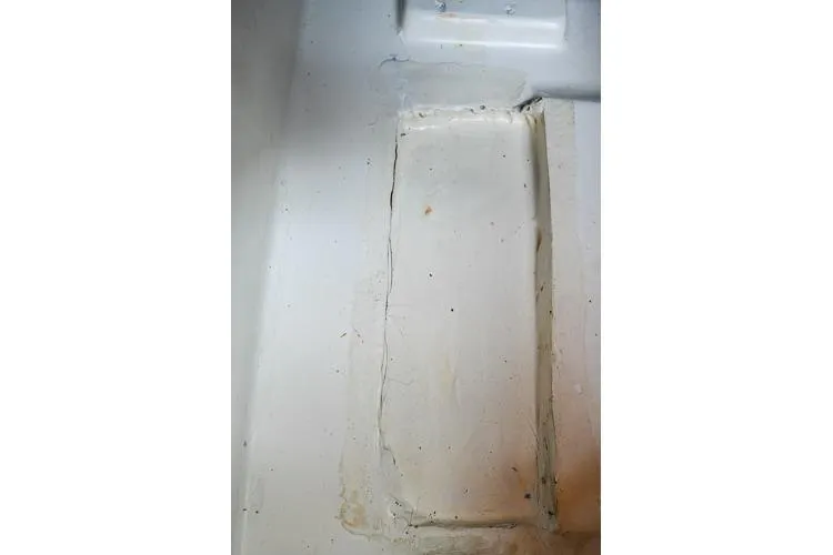 Slide: The Image of Interior detail of 2008 Beneteau Oceanis 46 sailboat, showing a repaired section. - 52