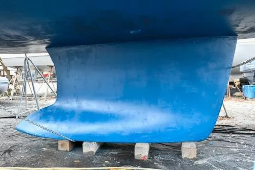 Slide: The Image of Propeller of 2008 Beneteau Oceanis 46 sailboat on stands in a boatyard. - 7