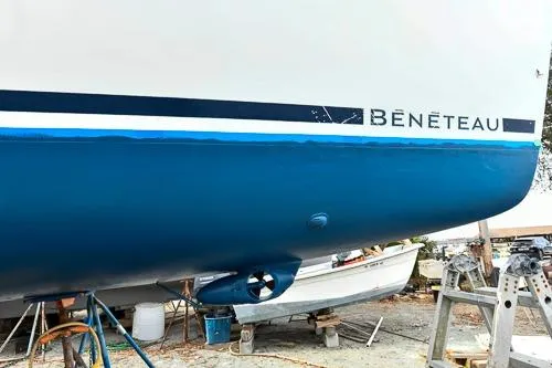 Slide: The Image of 2008 Beneteau Oceanis 46 yacht cockpit with navigation equipment and wooden steering wheel. - 9