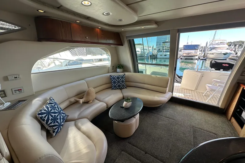 Slide: The Image of Luxurious interior of 2000 Maxum 4600 SCB yacht with marina view. - 8