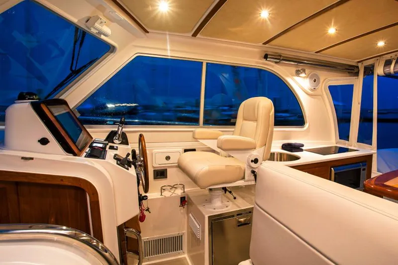 Slide: The Image of Manufacturer Provided Image: 2019 Back Cove 34O boat interior with helm station and seating. - 13