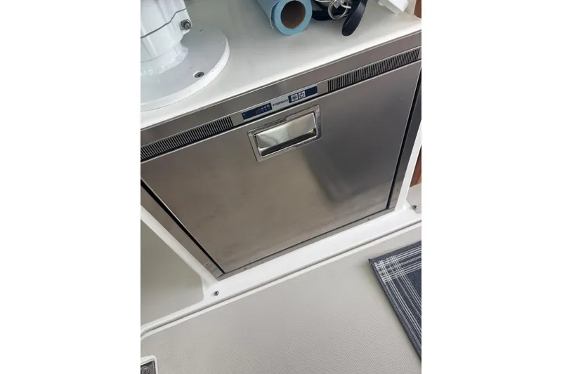 Slide: The Image of Stainless steel appliance on 2019 Back Cove 34O boat interior. - 19