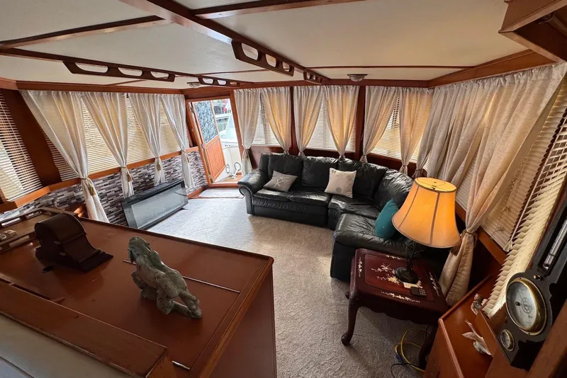 Slide: The Image of Luxurious interior of 1988 Jefferson 52 Monticello yacht with elegant furnishings and natural light. - 26