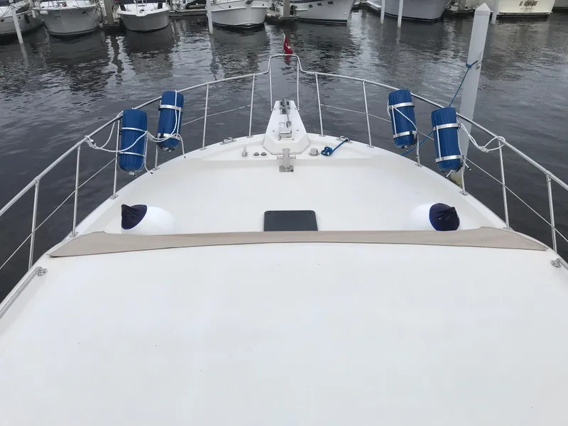 Slide: The Image of Compact bathroom in 1988 Jefferson 52 Monticello yacht with sink and shower area. - 44