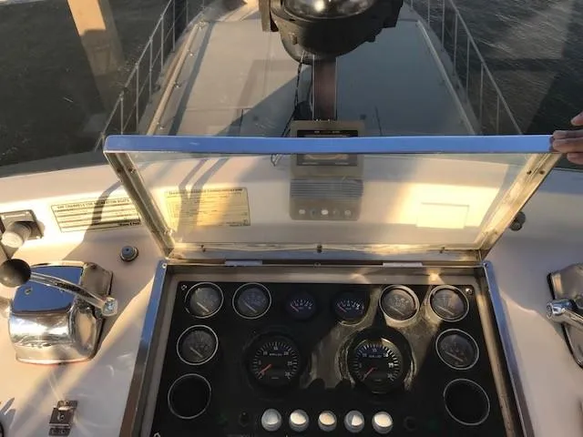 Slide: The Image of Compact bathroom in 1988 Jefferson 52 Monticello with marble sink and wooden accents. - 46