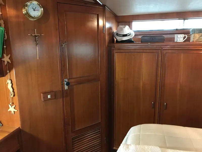 Slide: The Image of Engine room of 1988 Jefferson 52 Monticello yacht, showcasing mechanical components. - 61