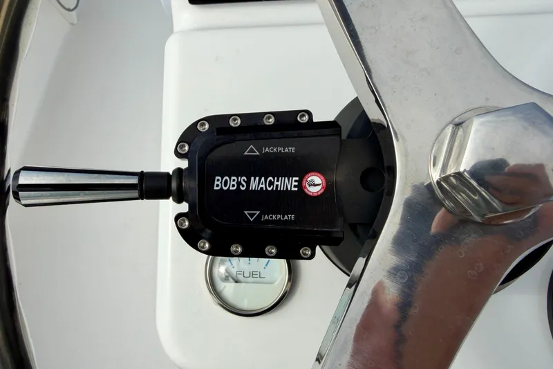 Slide: The Image of Close-up of 2024 Outlaw Legend 17 boat controls with Bob's Machine jack plate. - 22