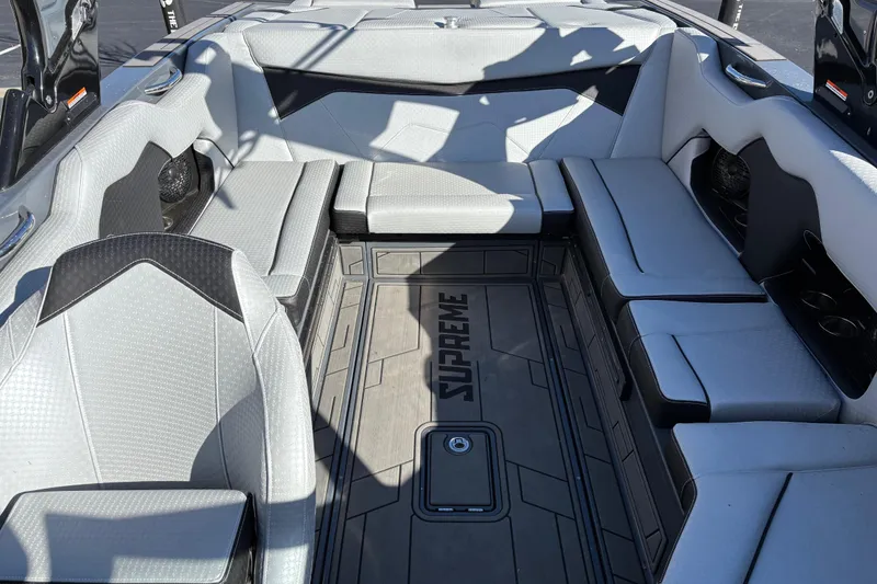 Slide: The Image of 2023 Supreme ZS232 boat interior with sleek gray seating and modern design. - 12