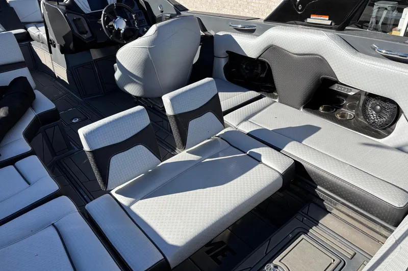 Slide: The Image of 2023 Supreme ZS232 boat interior with modern seating and sleek design. - 13