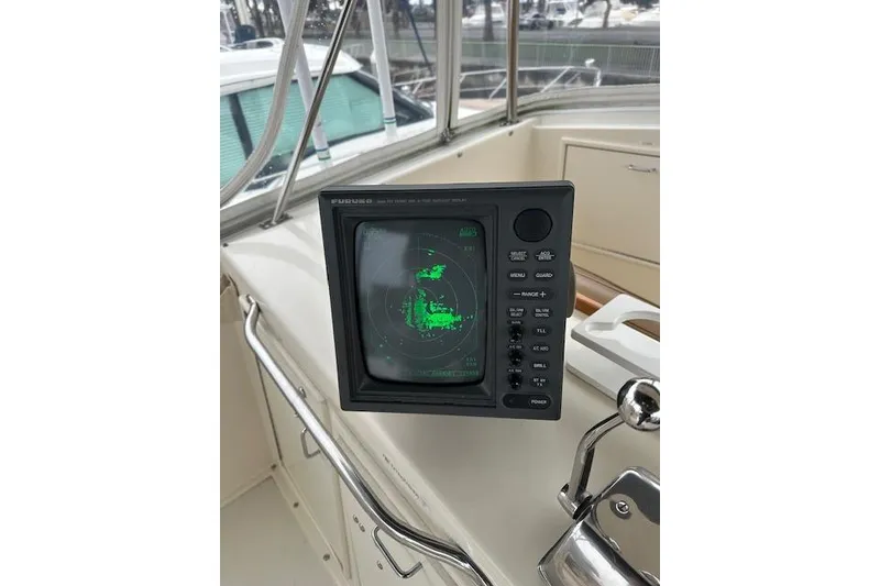 Slide: The Image of Radar display on 1988 Ocean 44' Super Sport yacht dashboard. - 18