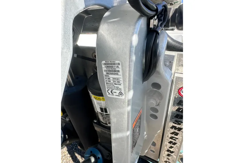 Slide: The Image of Close-up of a 2026 Action Craft 24 Bay boat engine component with labels. - 7