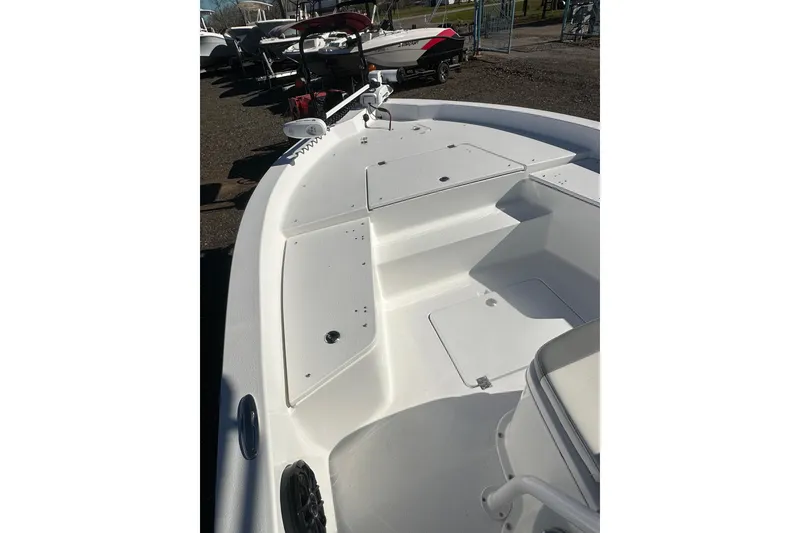 Slide: The Image of 2026 Action Craft 24 Bay boat deck, featuring spacious storage compartments and sleek design. - 21