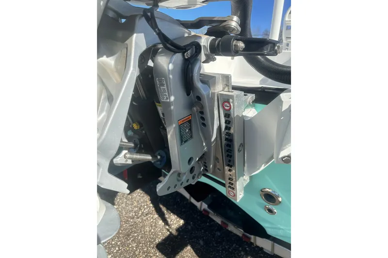 Slide: The Image of Close-up of 2026 Action Craft 24 Bay boat engine mount and components. - 6