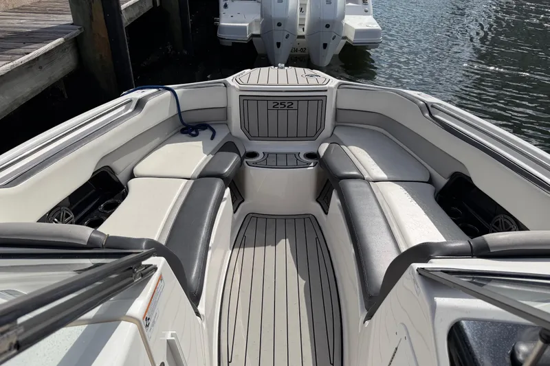 Slide: The Image of 2022 Yamaha Boats 252SD interior with sleek seating and modern design. - 21