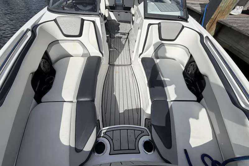 Slide: The Image of 2022 Yamaha Boats 252SD interior with sleek seating and modern design. - 23