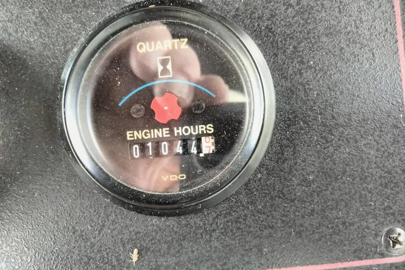 Slide: The Image of 1994 Carver 380 Santego engine hour meter showing 1044.7 hours. - 35