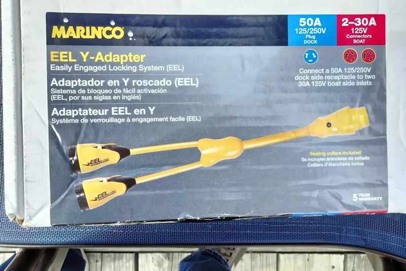 Slide: The Image of Marinco EEL Y-Adapter packaging on Carver 380 Santego, 1994 model, showcasing electrical connectors. - 37