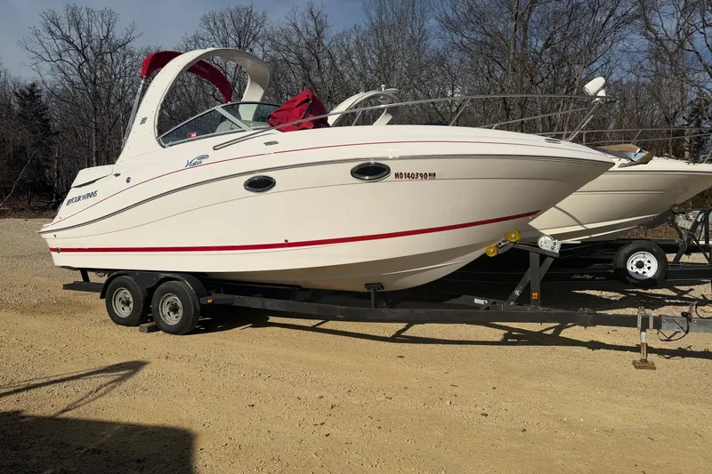 The Image of 2006 Four Winns 278 Vista boat on trailer, parked outdoors. - 0