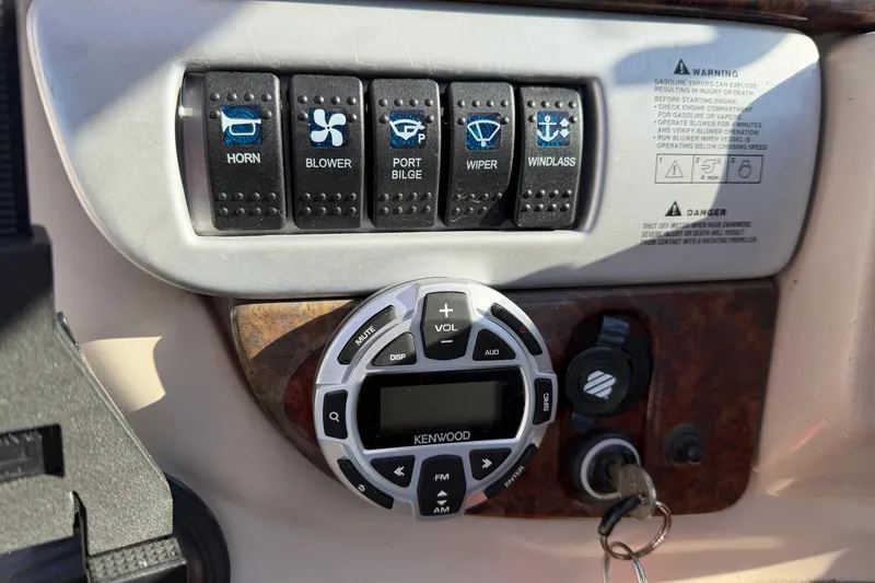Slide: The Image of Control panel of a 2006 Four Winns 278 Vista boat with Kenwood audio system. - 15