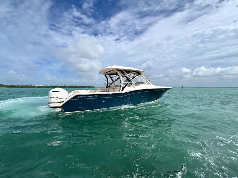 Slide: The Image of 2021 Grady-White Freedom 325 boat on open sea. - 20