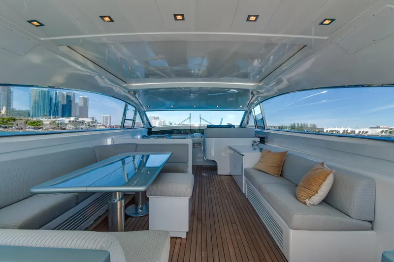 Slide: The Image of Luxurious 2007 Leopard Express Motor Yacht interior with elegant seating and city skyline views. - 15