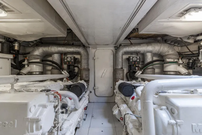 Slide: The Image of Engine room of 2007 Leopard Express Motor Yacht with dual engines and piping. - 31