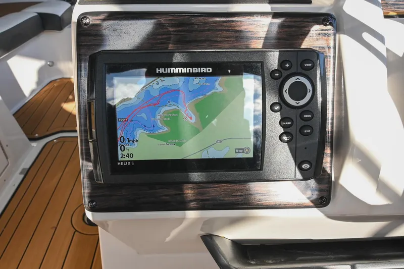 Slide: The Image of 2023 Starcraft SVX 230 IO boat with Humminbird Helix 5 navigation system. - 25