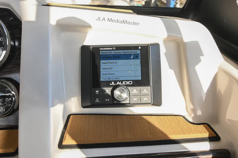Slide: The Image of 2023 Starcraft SVX 230 IO boat dashboard featuring JL Audio MediaMaster control panel. - 27