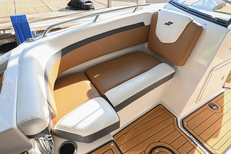 Slide: The Image of 2023 Starcraft SVX 230 IO boat interior with tan and white seating. - 39