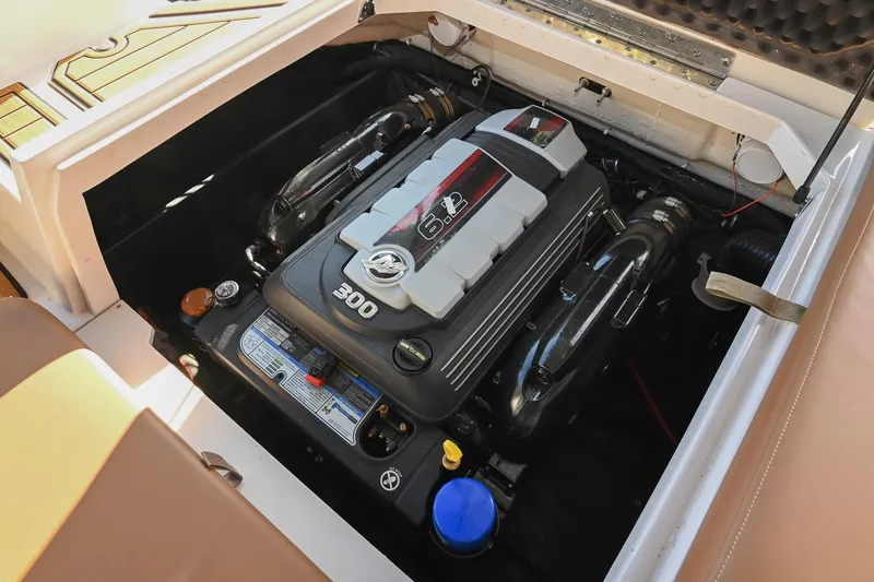 Slide: The Image of 2023 Starcraft SVX 230 IO boat engine compartment with 6.2L 300 HP engine. - 43