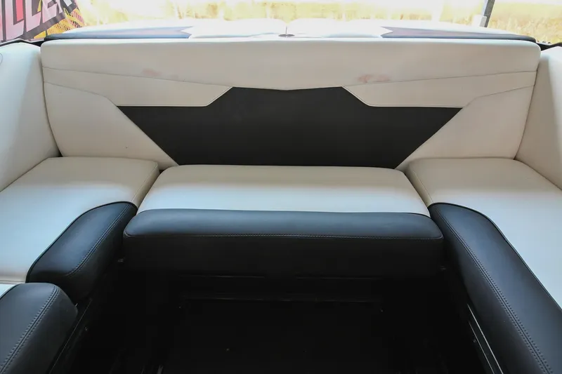 Slide: The Image of 2022 Axis A22 boat interior with black and white seating design. - 18