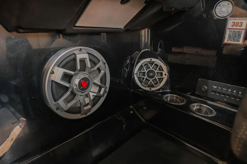 Slide: The Image of 2022 Axis A22 boat interior with speakers and control panel. - 29