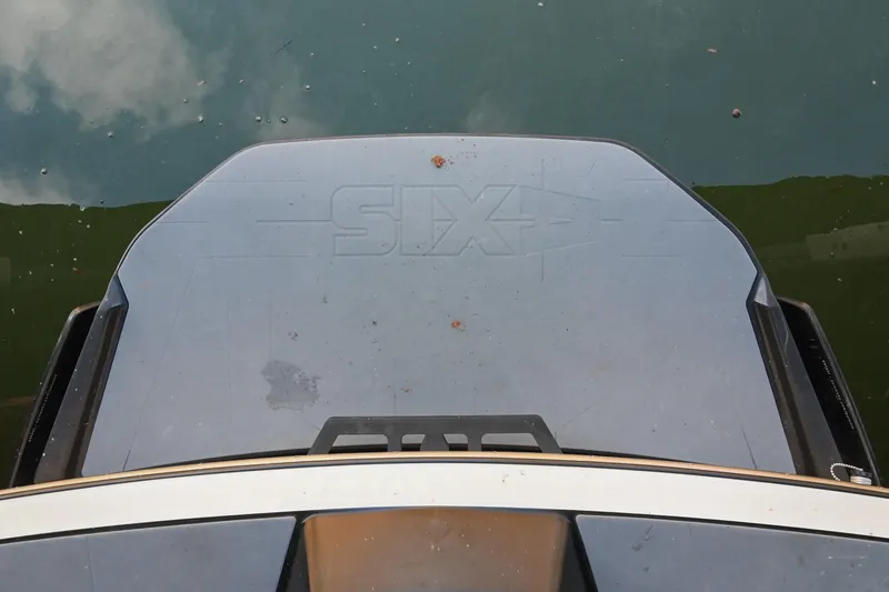 Slide: The Image of 2022 Axis A22 boat swim platform on calm water surface. - 9