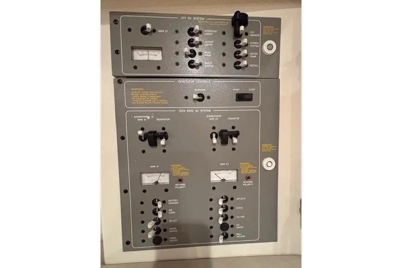 Slide: The Image of Electrical control panel of a 2000 Formula 31 Performance Cruiser boat. - 15