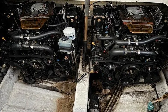 Slide: The Image of Engine compartment of a 2000 Formula 31 Performance Cruiser, showcasing dual engines and components. - 20