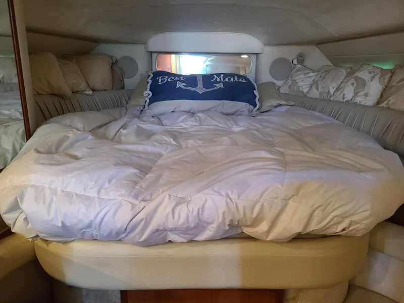 Slide: The Image of Interior of 1999 Sea Ray 340 Sundancer with cozy bed. - 14