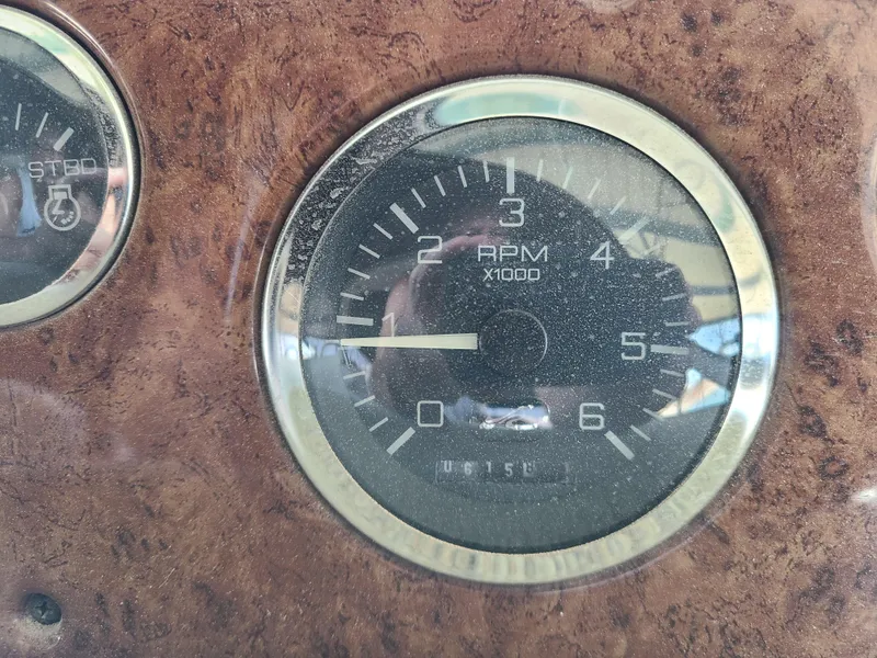 Slide: The Image of 1999 Sea Ray 340 Sundancer RPM gauge close-up. - 19