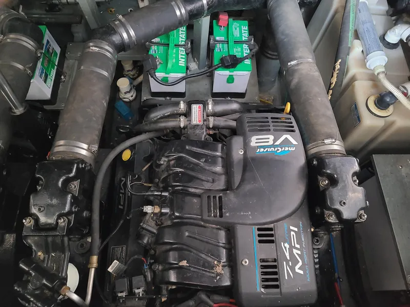 Slide: The Image of Engine compartment of a 1999 Sea Ray 340 Sundancer boat with V8 engine. - 20